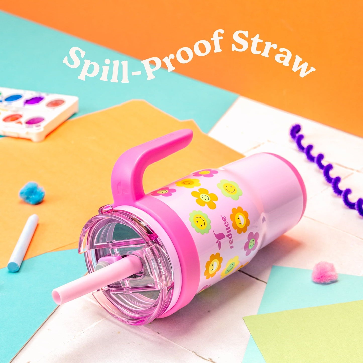 Coldee Kids 18oz tumbler with handle and spill-proof straw, insulated cup for children’s drinks on clorful background