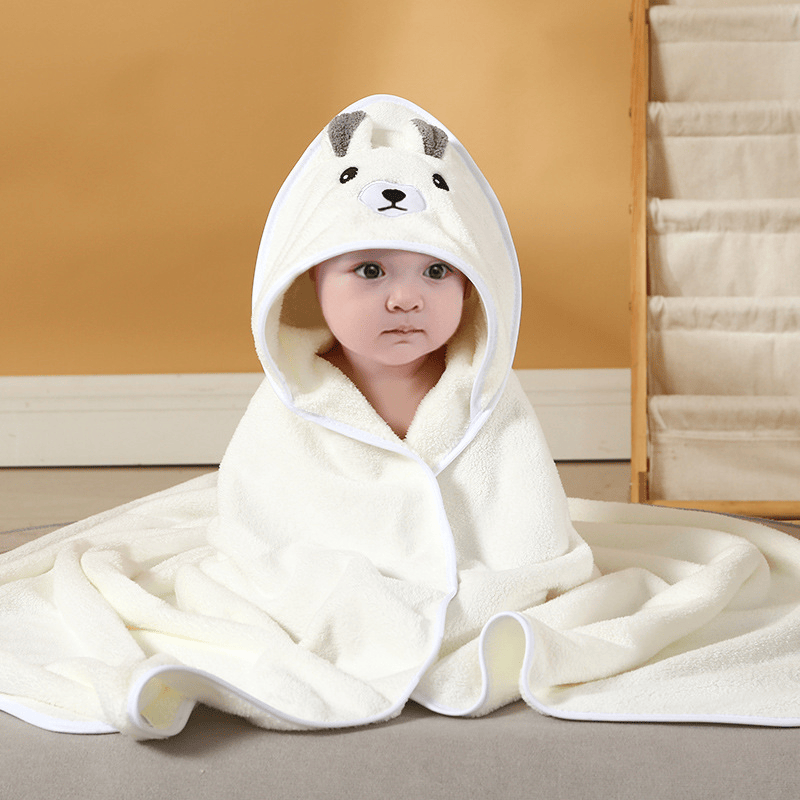 Hooded baby bath towel, made of ultra-soft and absorbent coral fleece, featuring a cute animal hood design. Suitable for newborns, infants and children, ideal for use in bathing, at the beach and by t