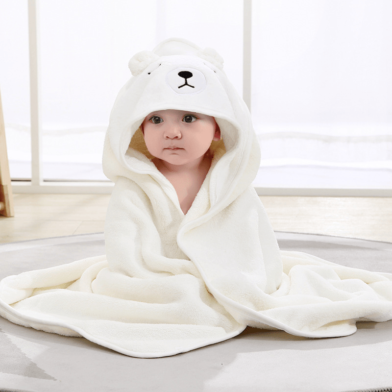 Hooded baby bath towel, made of ultra-soft and absorbent coral fleece, featuring a cute animal hood design. Suitable for newborns, infants and children, ideal for use in bathing, at the beach and by t