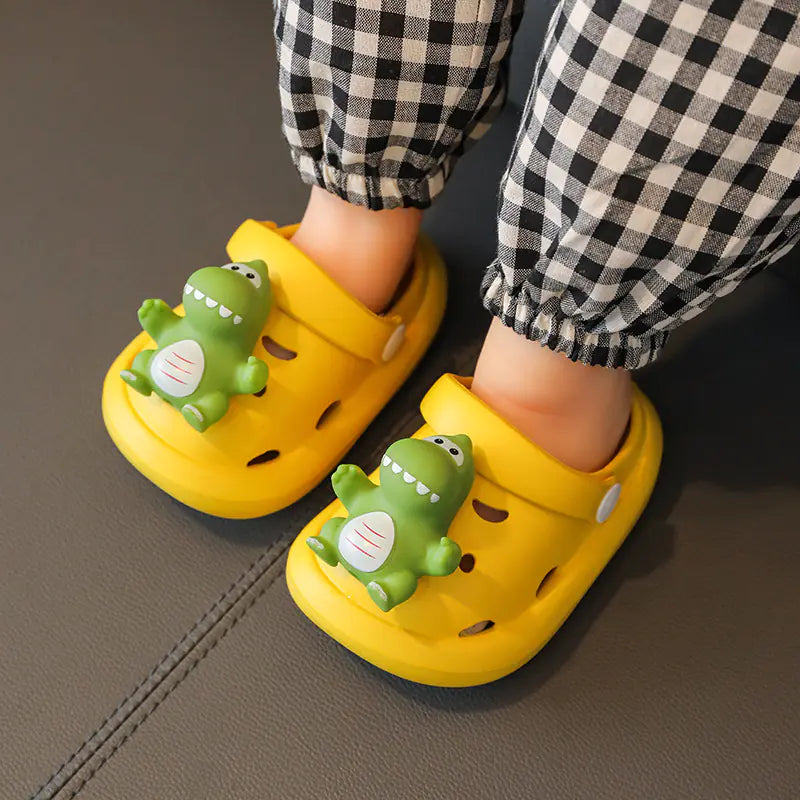 DinoStomp– Thick-Bottom Cartoon Slippers for Kids’ Cozy Adventures