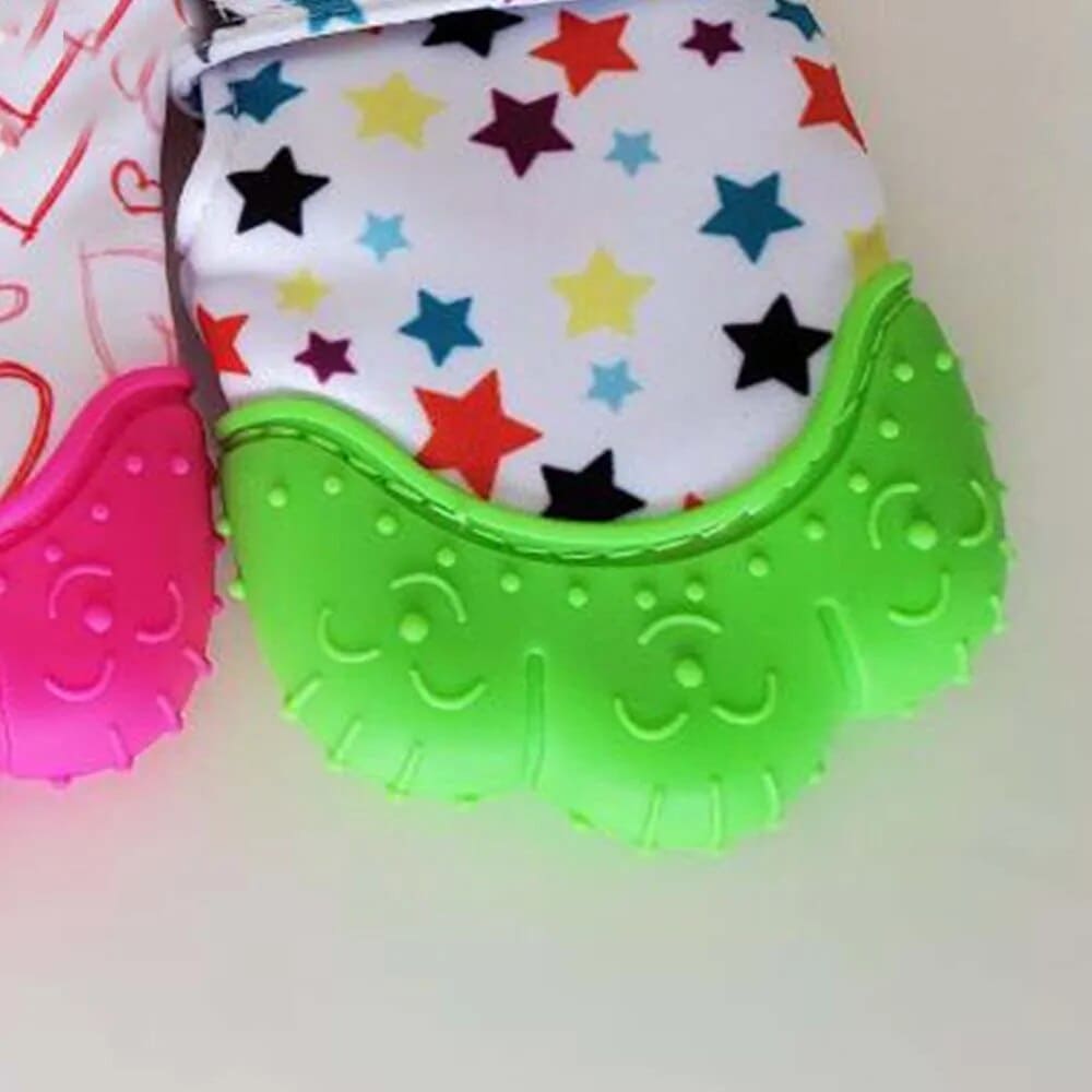 Keep Teething Troubles at Bay with our Heart & Star Print Silicone Teether Mitten! ππΆπ¦· - The Little Big Store