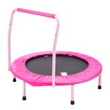 Angled view of pink mini trampoline with perimeter cover