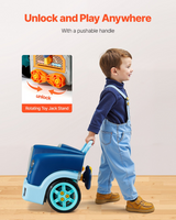 Child moving the blue mechanic workshop using its handle and rolling wheels