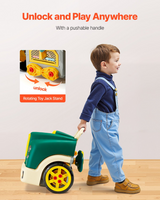 Child pulling the green workshop by its handle