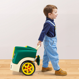 Green workshop being pulled on its wheels