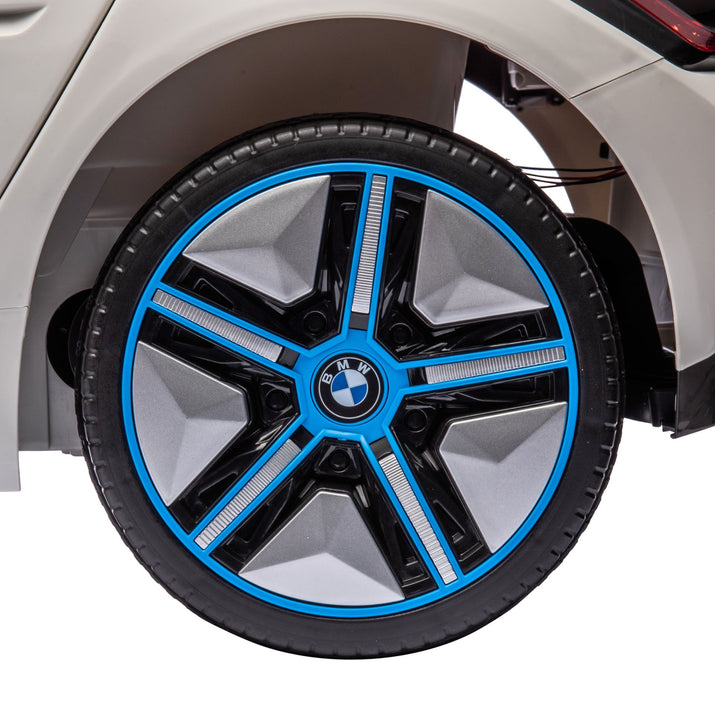Close-up of a car wheel with a BMW logo on a white background