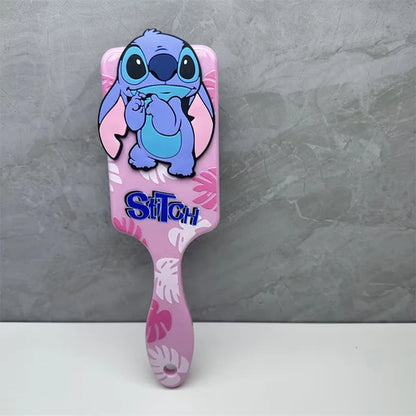 Pink hairbrush with cartoon character and 'Stitch' branding on a gray background