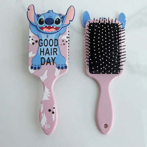 Hairbrush with cartoon character design and 'Good Hair Day' text on a white background