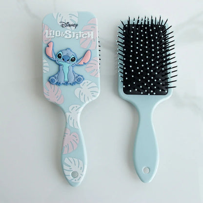 Hairbrush with Lilo & Stitch design on a light blue handle