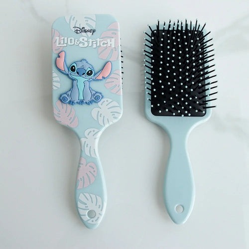 Hairbrush with Lilo & Stitch design on a light blue handle