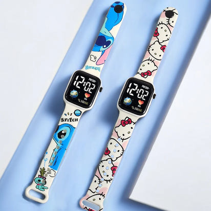 Two digital watches with cartoon-themed straps on a light blue background
