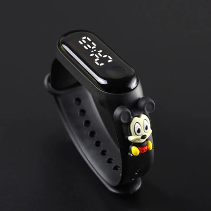 Black digital watch with cartoon character on a dark background