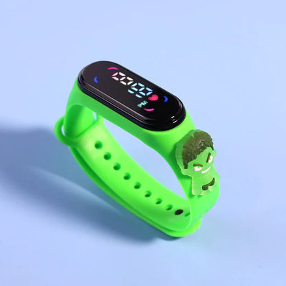 Green smartwatch with a cartoon character on a light blue background