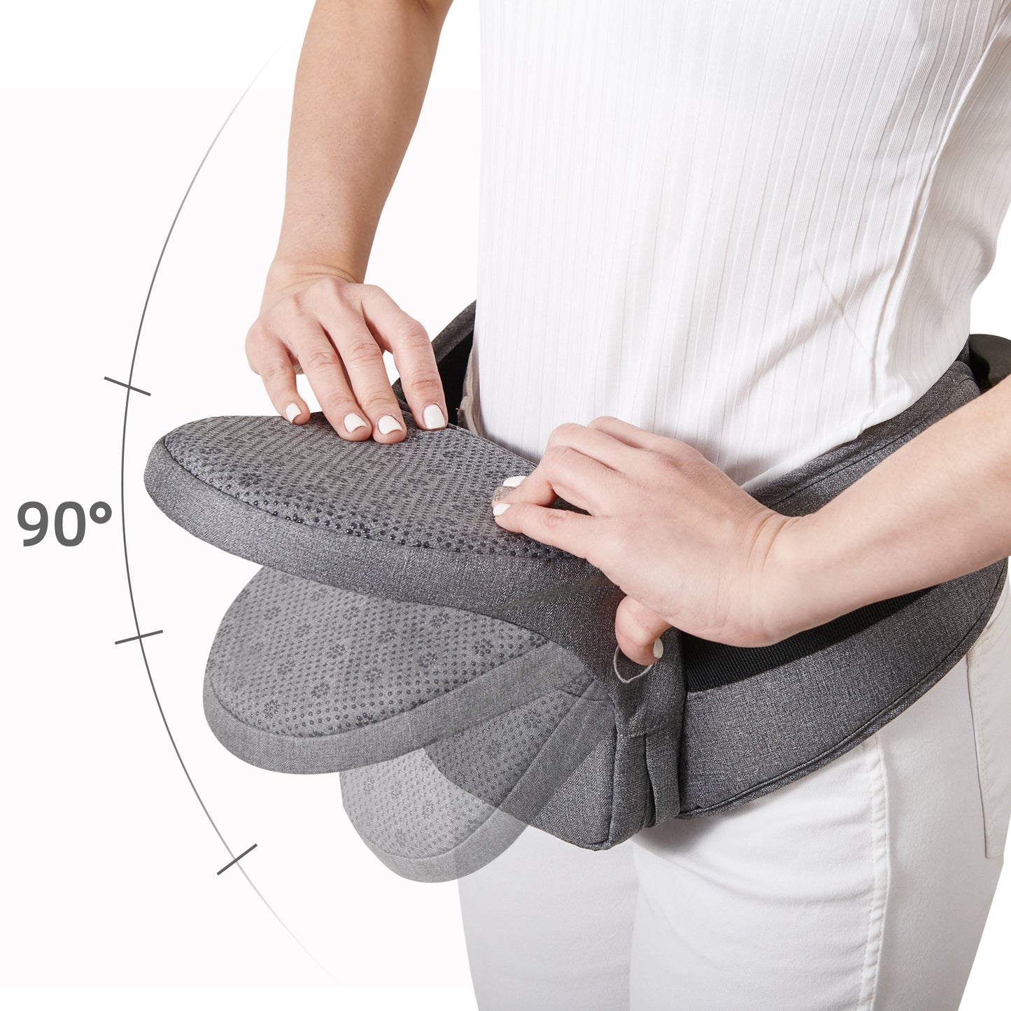 Person holding a gray seat cushion with a white background