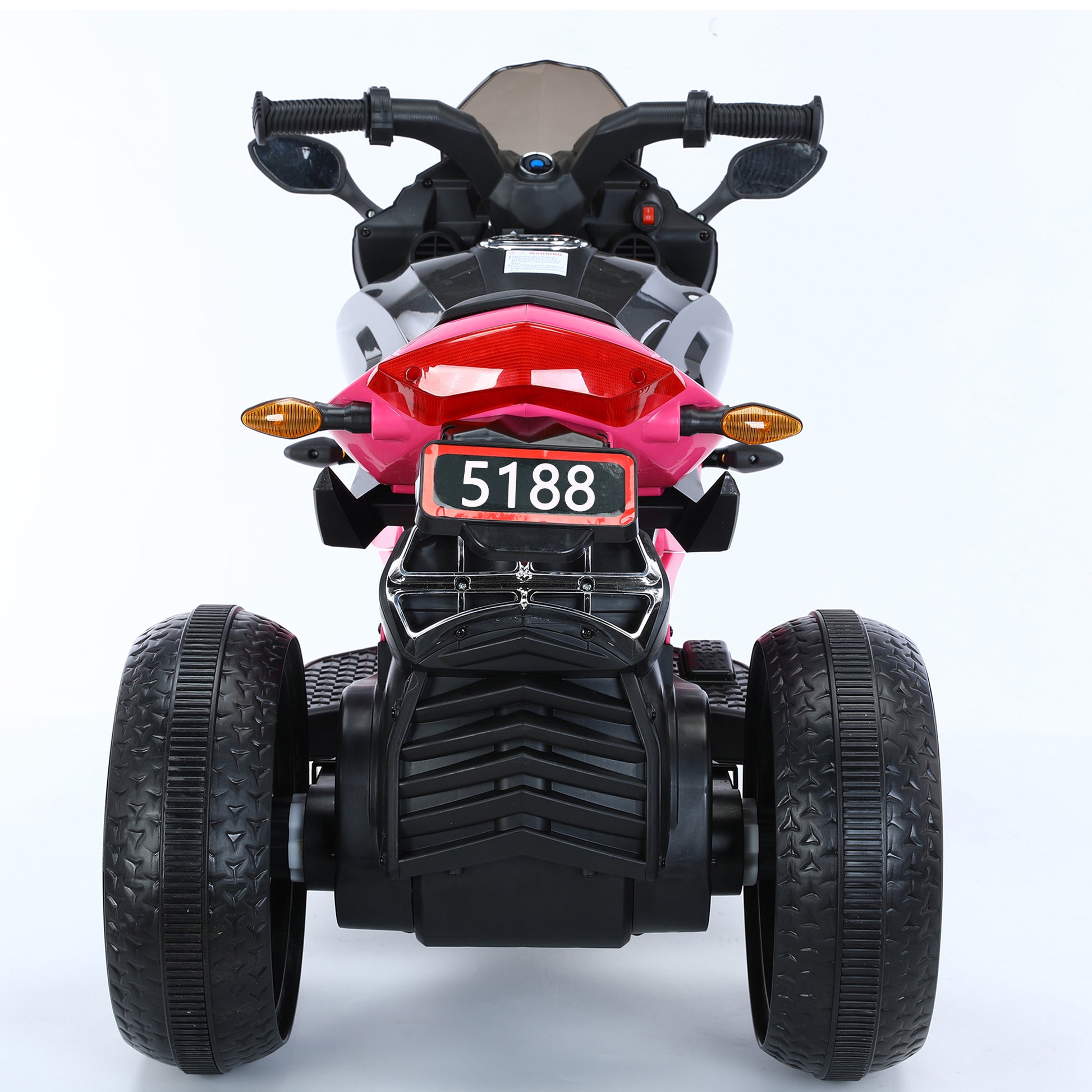 Black and red toy motorcycle on a white background