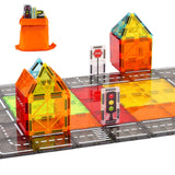 Close-up of magnetic tile houses, road crossing and printed traffic signals