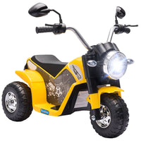 Yellow and black toy motorcycle with lights on a white background