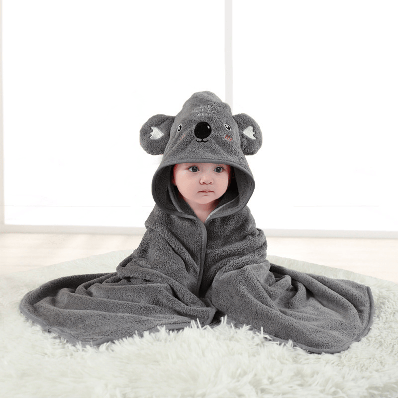 Hooded baby bath towel, made of ultra-soft and absorbent coral fleece, featuring a cute animal hood design. Suitable for newborns, infants and children, ideal for use in bathing, at the beach and by t