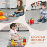 Children arranging magnetic city roads and buildings