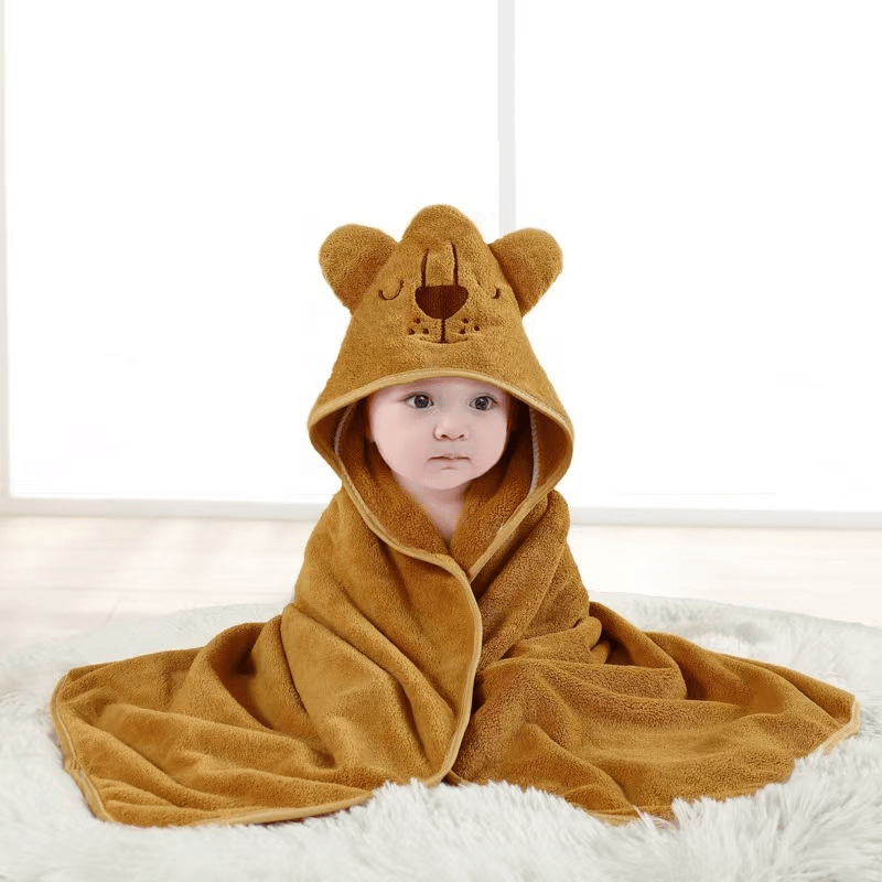 Hooded baby bath towel, made of ultra-soft and absorbent coral fleece, featuring a cute animal hood design. Suitable for newborns, infants and children, ideal for use in bathing, at the beach and by t