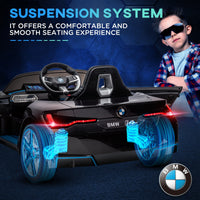 Children's toy car with BMW logo and suspension system feature text on a dark background