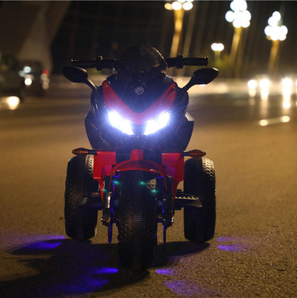 Kids 12V electric ride-on motorcycle with training wheels, headlights, and realistic design on outdoor background