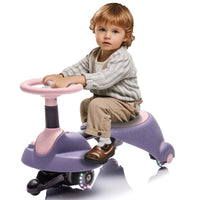 Child sitting on a purple and pink toy car with a white background