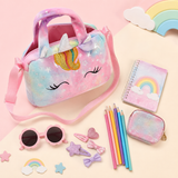 Unicorn handbag with everyday treasures flat lay