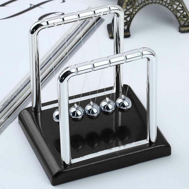 Newton's Cradle: The Art of Perpetual Motion - The Little Big Store