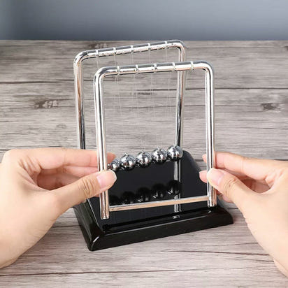 Newton's Cradle: The Art of Perpetual Motion - The Little Big Store